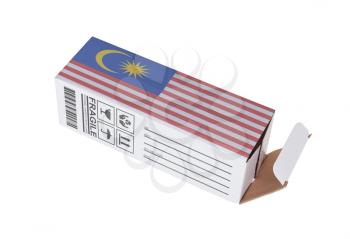 Concept of export, opened paper box - Product of Malaysia
