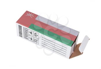 Concept of export, opened paper box - Product of Oman