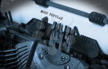 Close-up of an old typewriter with paper, selective focus, Most popular