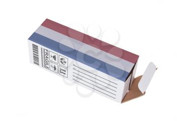 Concept of export, opened paper box - Product of the Netherlands