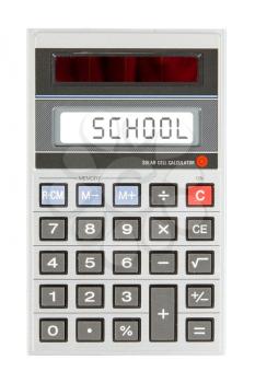 Old calculator showing a text on display - school
