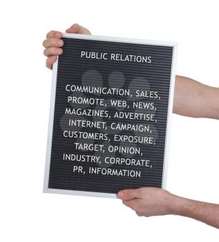 Public relations concept in plastic letters on very old menu board, vintage look