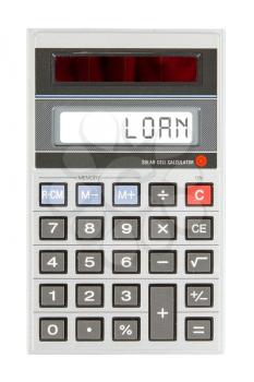 Old calculator showing a text on display - loan