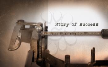 Close-up of a vintage typewriter, selective focus, story of success