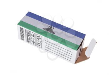 Concept of export, opened paper box - Product of Lesotho