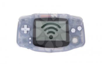 Old dirty portable game console with a small screen - wifi spot symbol