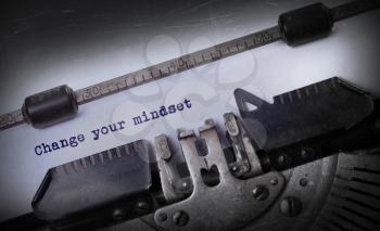 Vintage inscription made by old typewriter, Change your mindset