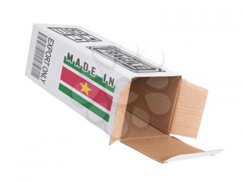 Concept of export, opened paper box - Product of Suriname