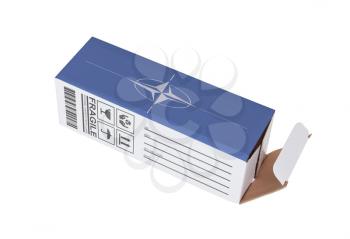 Concept of export, opened paper box - Product of the NATO