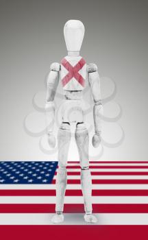 Old wood figure mannequin with US state flag bodypaint - Alabama