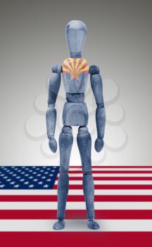 Old wood figure mannequin with US state flag bodypaint - Arizona