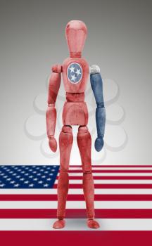 Old wood figure mannequin with US state flag bodypaint - Tennessee
