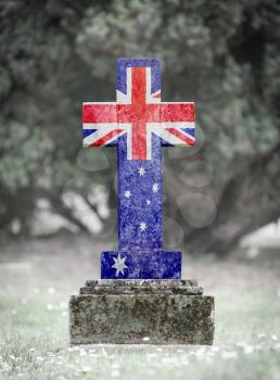 Old weathered gravestone in the cemetery - Australia