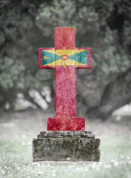 Old weathered gravestone in the cemetery - Grenada
