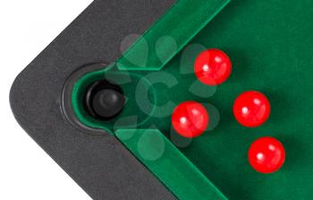 Red snooker balls on a snooker table