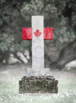 Old weathered gravestone in the cemetery - Canada