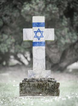 Old weathered gravestone in the cemetery - Israel