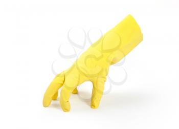 Rubber cleaning glove standing on its fingers