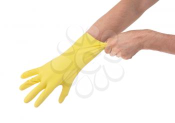 Hand in yellow glove - isolated on white background