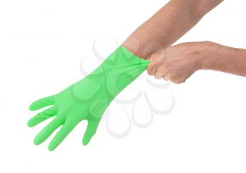 Hand in green glove - isolated on white background