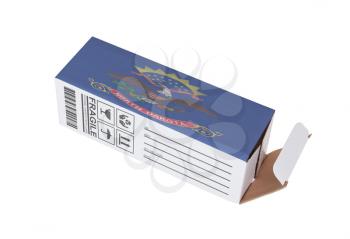 Concept of export, opened paper box - Product of North Dakota