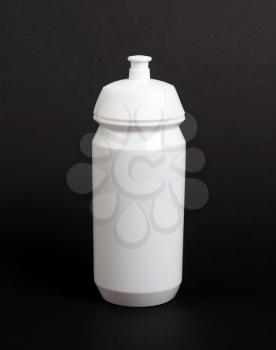 White water bottle isolated on black background