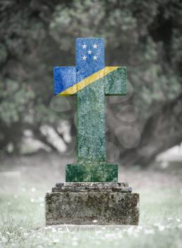 Old weathered gravestone in the cemetery - Solomon Islands