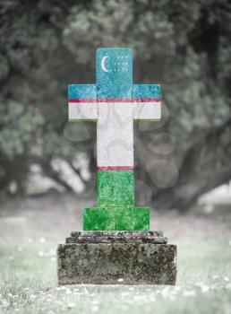 Old weathered gravestone in the cemetery - Uzbekistan