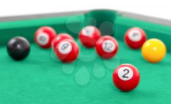 Snooker balls on a green snooker table