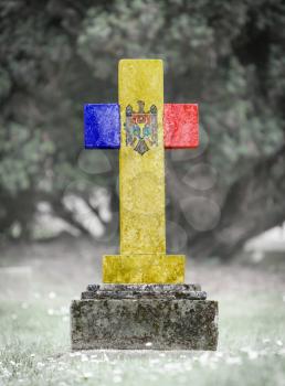 Old weathered gravestone in the cemetery - Moldova
