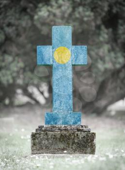 Old weathered gravestone in the cemetery - Palau