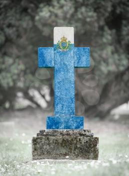 Old weathered gravestone in the cemetery - San Marino