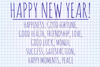 Happy new year word cloud written on a piece of paper