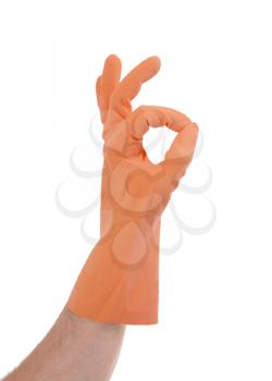 Hand gesturing with orange cleaning product glove - isolated on white