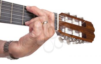 Old hand and guitar isolated on white background