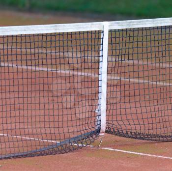 Close-up of the net on a tennis court