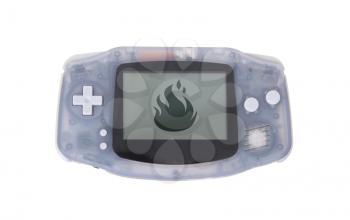 Old dirty portable game console with a small screen - fire