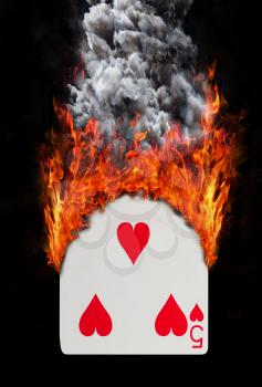 Playing card with fire and smoke, isolated on white - Five of hearts