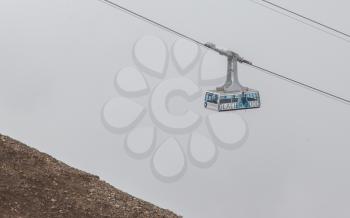 LES DIABLERETS, SWIZTERLAND - JULY 22: Ski lift to area Glacier 3000 on July 22, 2015. The area houses the world only suspension bridge between 2 mountain peaks.