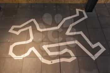 Crime scene chalk line of a body