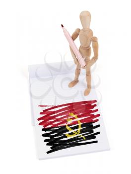 Wooden mannequin made a drawing of a flag - Angola