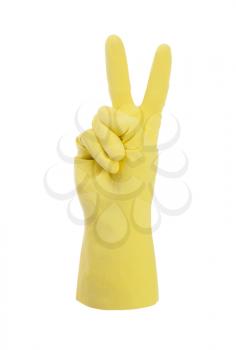 Yellow cleaning glove, victory sign, isolated on white