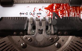 Bloody note - Vintage inscription made by old typewriter, SOS