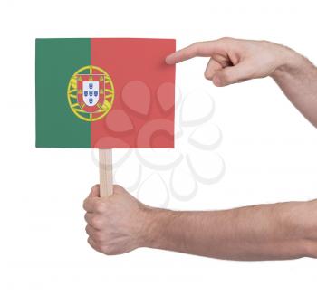 Hand holding small card, isolated on white - Flag of Portugal