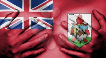 Upper part of female body, hands covering breasts, flag of Bermuda