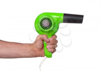 Old green hairdryer in hand isolated on white