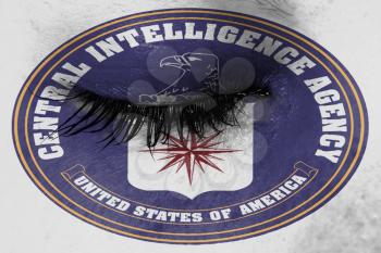 Women eye, close-up, tear, logo of the CIA