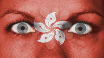 Women eye, close-up, eyes wide open, flag of Hong Kong