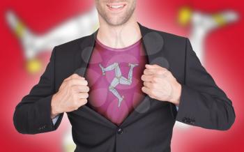 Businessman opening suit to reveal shirt with flag, Isle of Man
