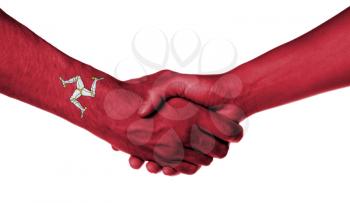 Man and woman shaking hands, wrapped in flag pattern, Isle of Man